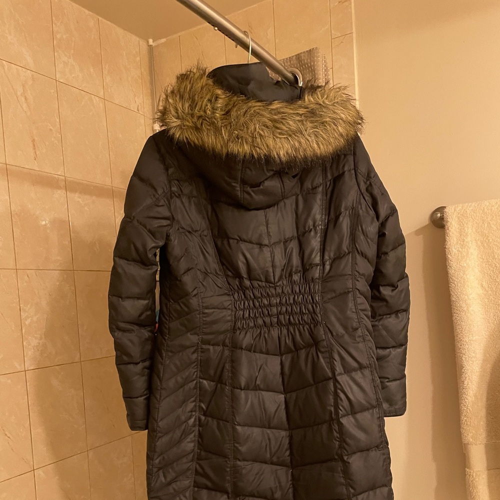 Long Michael Kors jacket with hood. Size is PM. Color is black